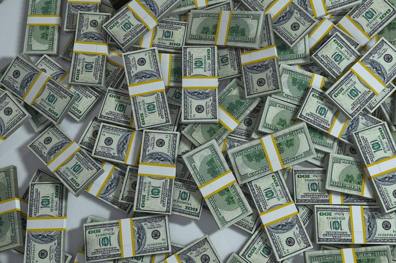 blog picture of stacks of money