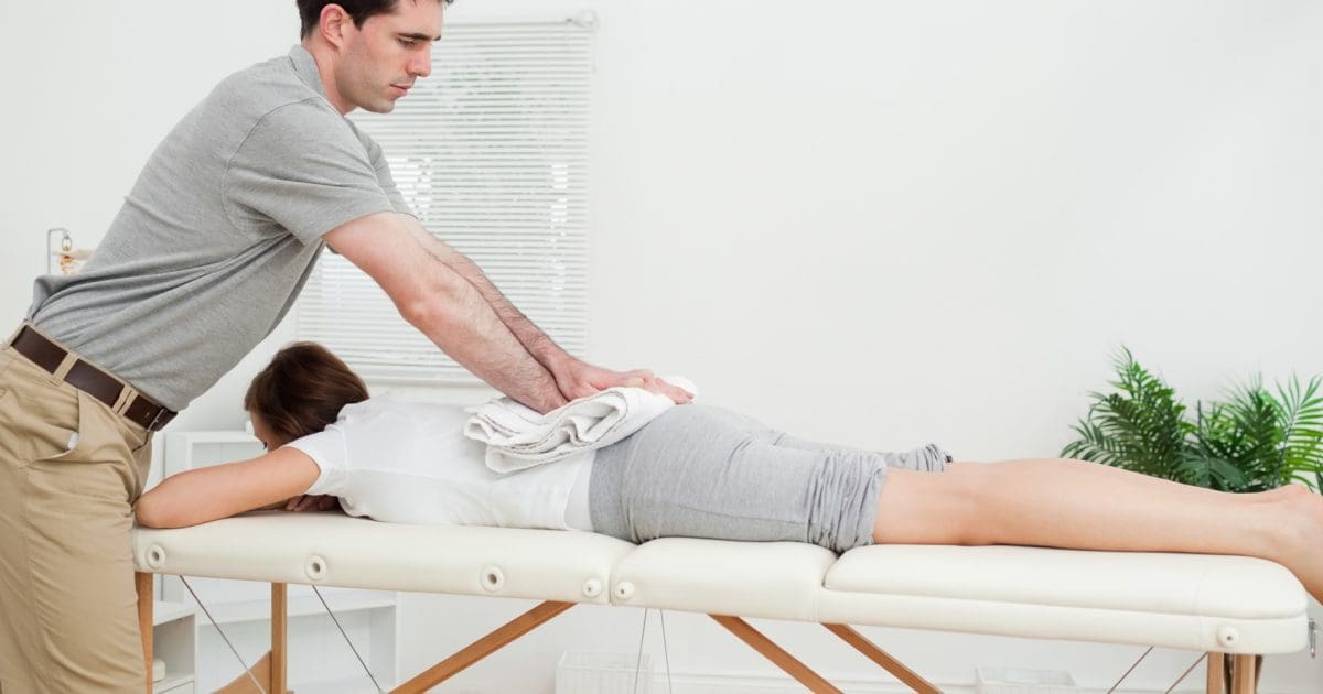 Image of a chiropractor performing spinal adjustments and manual manipulations for low back pain and sciatica.